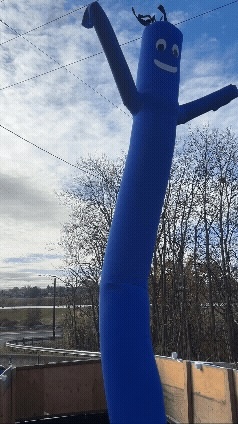 The inflatable blue dancing man who rode with us in the Veterans Day parade.